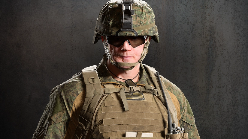 Valor operator in woodland camouflage and a helmet.